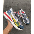 ￼Sacai X Nike VaporWaffle